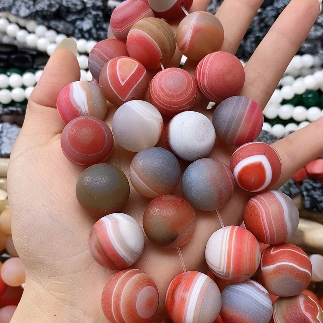 玛瑙/玉髓未镶嵌珠宝半成品卡二十左右橘皮玛瑙一条