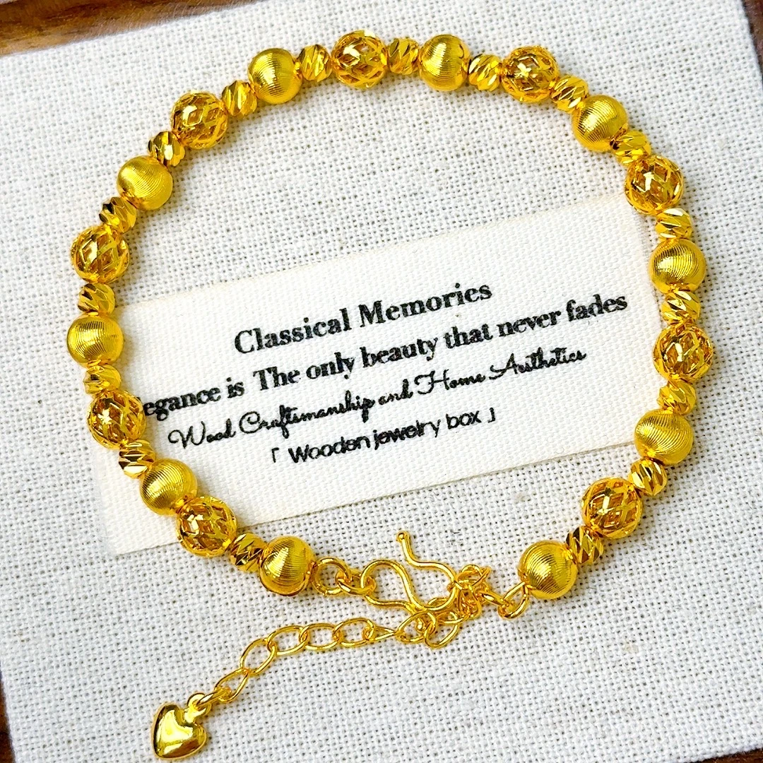 高定精工猫眼拉丝镂空珠相交手链G021