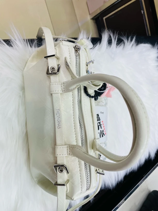 31号：玛莎2025新款女包高级感小众手提法棍时尚潮流百搭单肩斜挎。