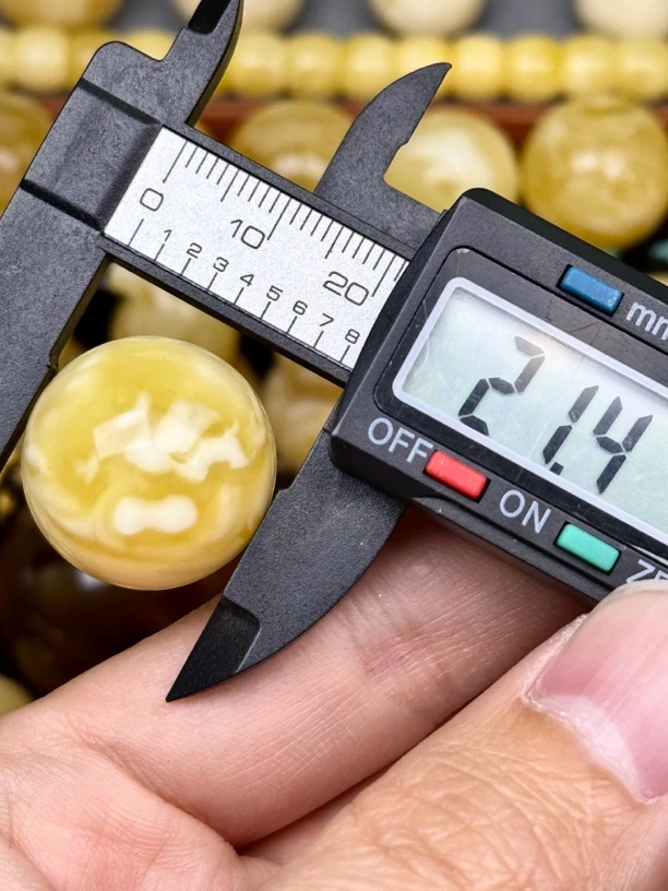 21.4mm俄料国矿一级料浓瓷白妖孽虎皮纹千层雪橘底金溶洞蜜蜡圆珠