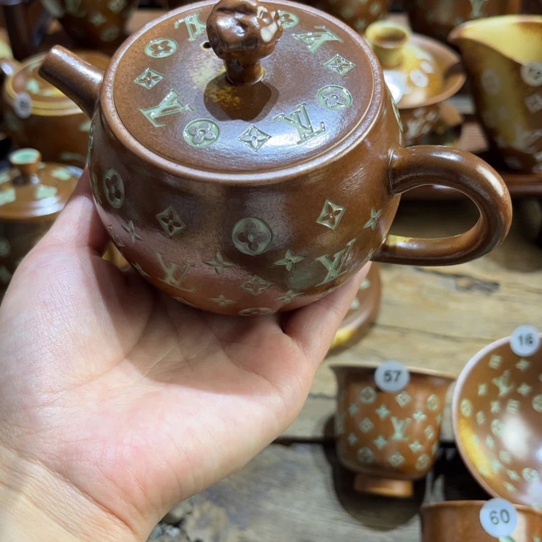 玲***草木灰老花壶填釉