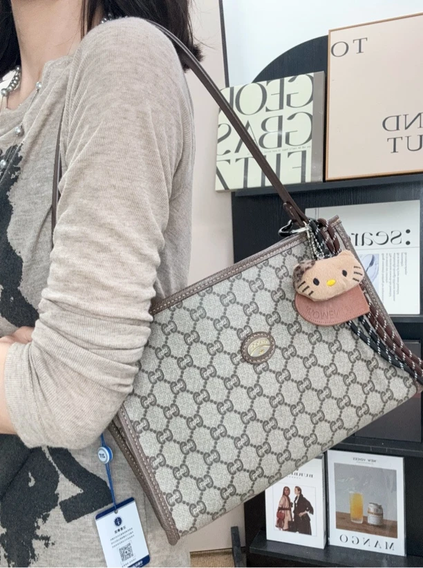 95新 GUCCI/古驰 老花手拿包单肩包/秋境 07010