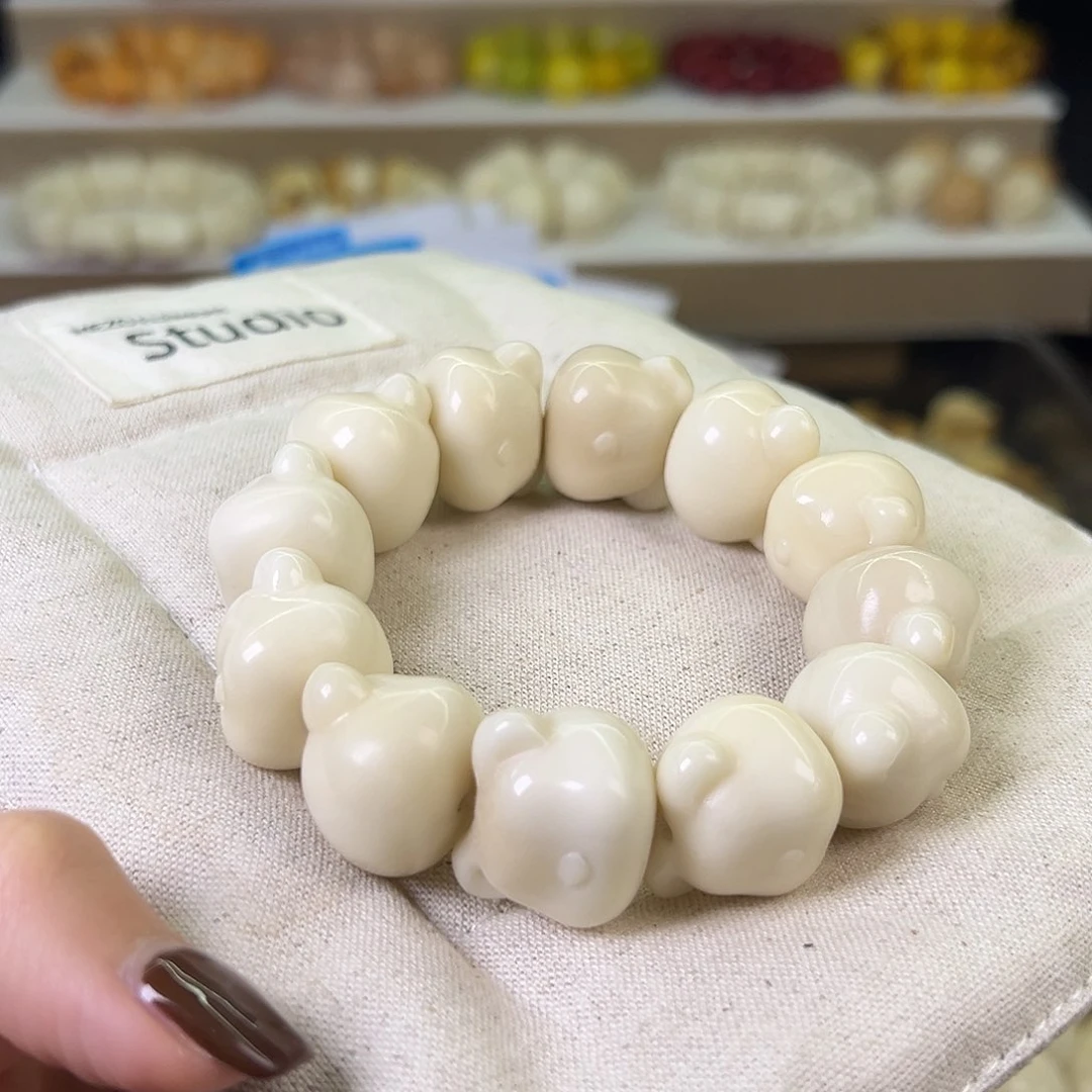 菩提根/象牙果手串微瑕卡22白熊头手串一条