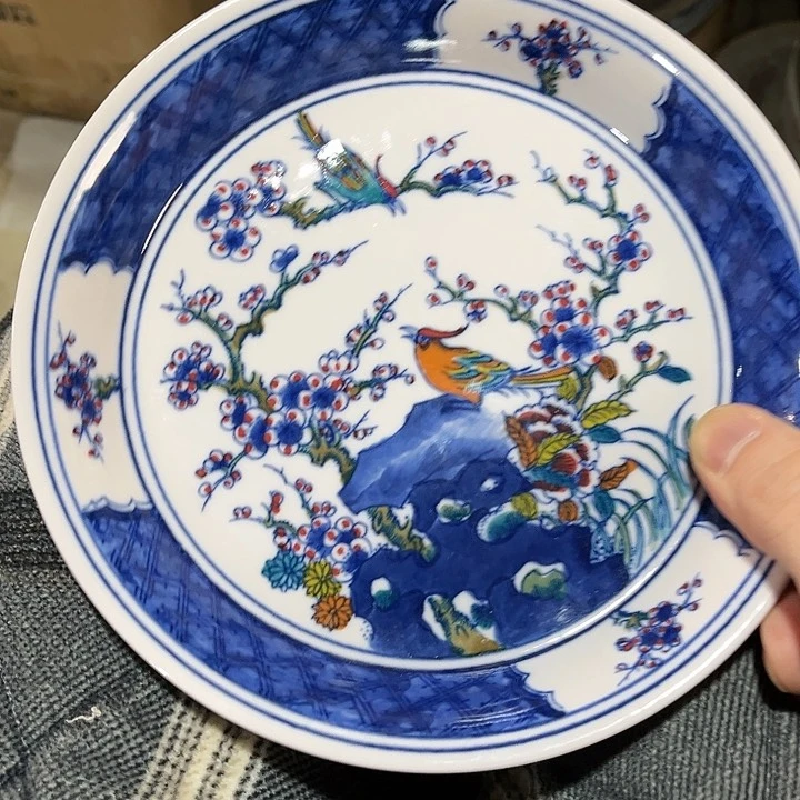 瓷片////直径19厘米。红西西。