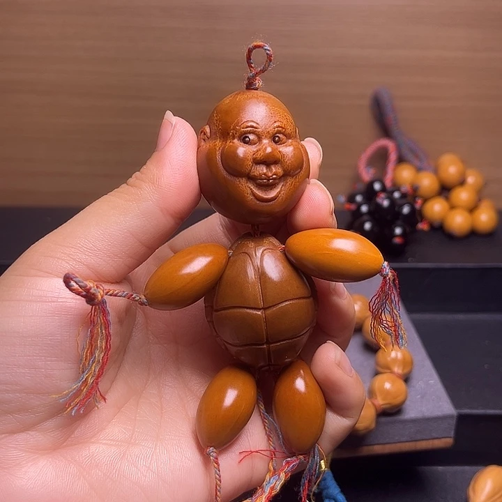 橄榄核吊坠富甲一方