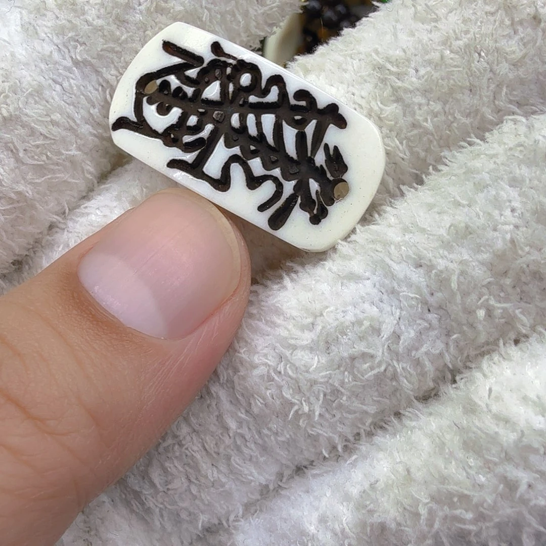 驼骨其他46驼骨双孔配饰一颗