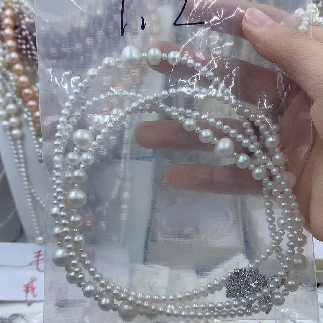 前***锦淡水珍珠银S925镶嵌耳饰