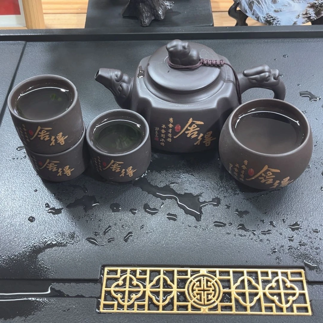 紫砂紫砂变色舍得(一壶四杯)