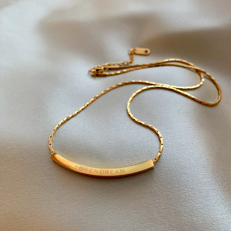 钛钢项链  极简钛钢字母微笑项链女轻奢毛衣链时尚百搭挂脖配饰品