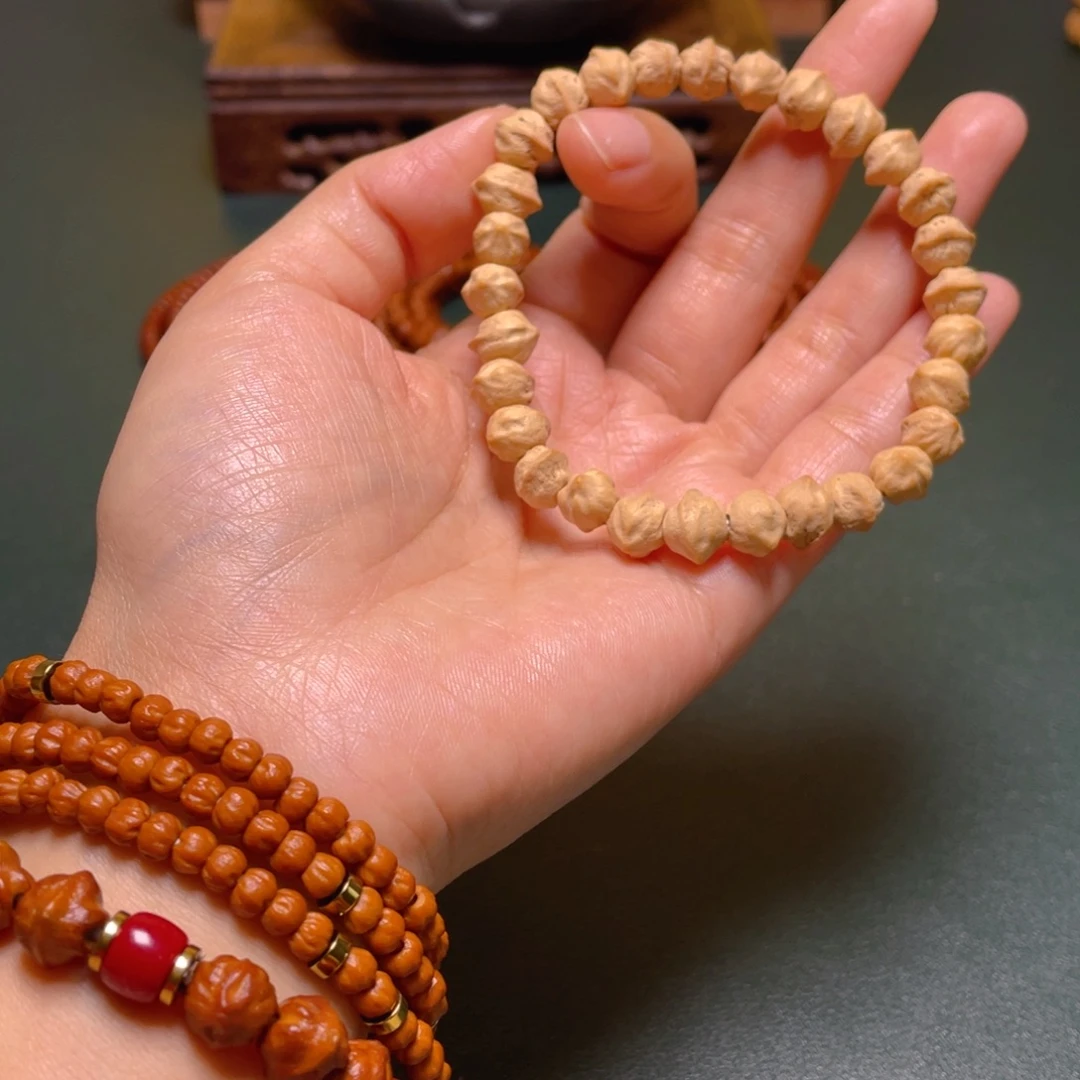 吊坠柏香籽/百香籽白牙横打单圈