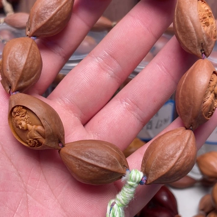 桃***岛手串/手链橄榄核1.8美女