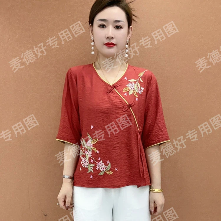 春夏新款中年妈妈装气质显瘦半袖洋气时尚宽松遮肚子印花卸扣小衫