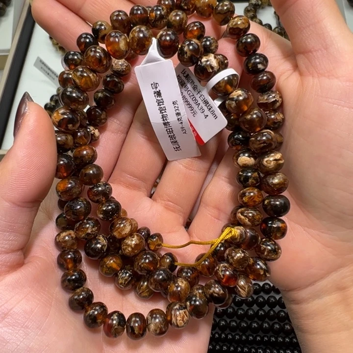 开***果琥珀未镶嵌裸石抚顺琥珀黑花蜡8m