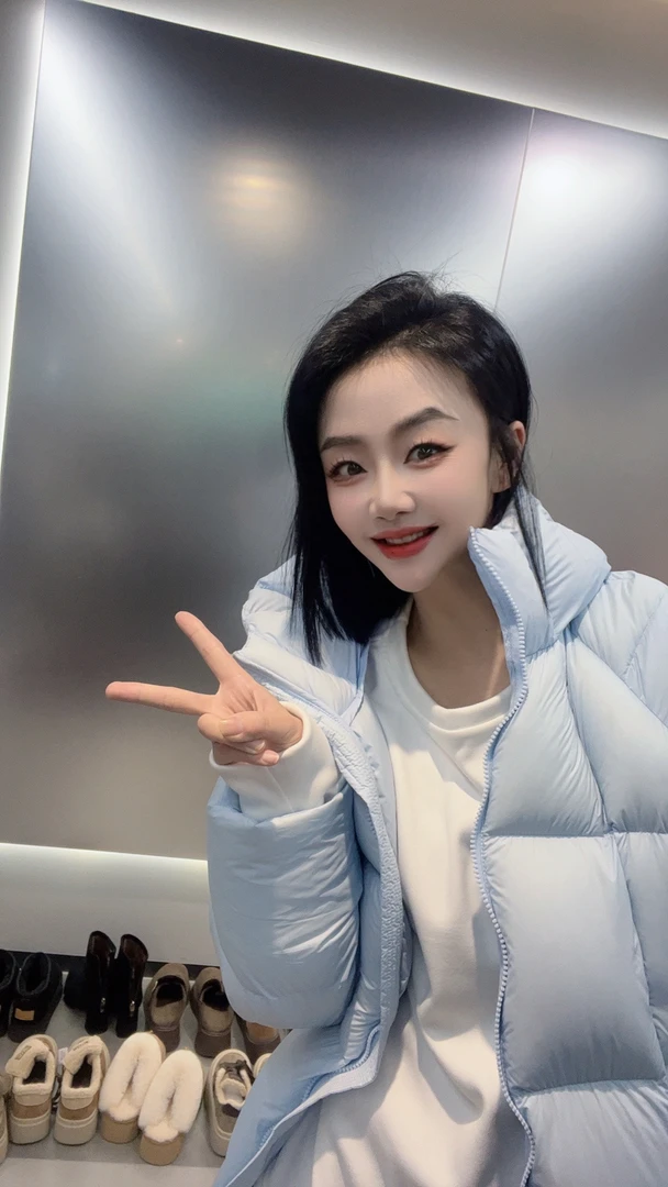 米莱Jiaer/新款时尚连帽拉链中长款休闲保暖羽绒服