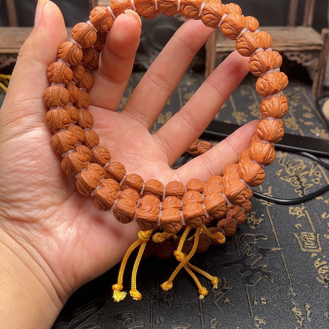 桃核吊坠玉龙手持