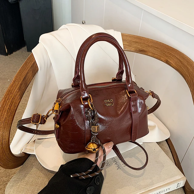 秋冬复古手提保龄球包女式2025新款韩国简约高级感单肩斜挎枕头包