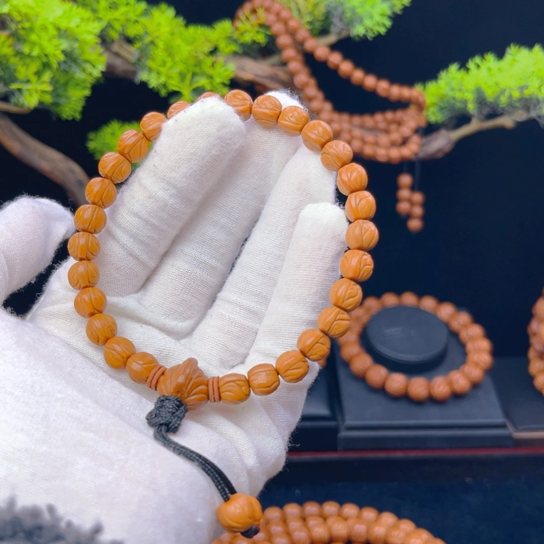 桔****桃核吊坠野生桃核