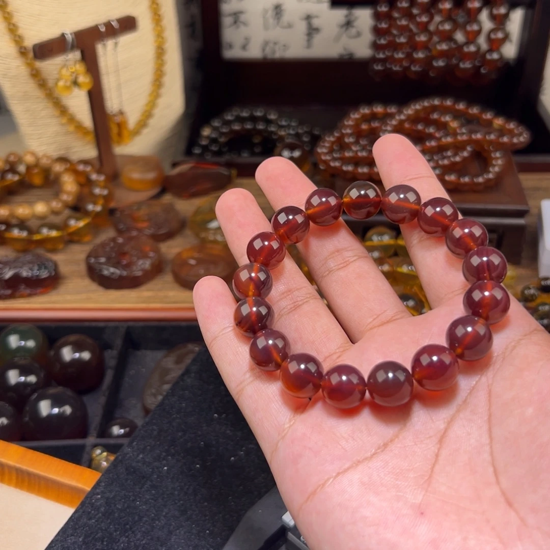 林***溪琥珀未镶嵌颈饰12mm棕红手串