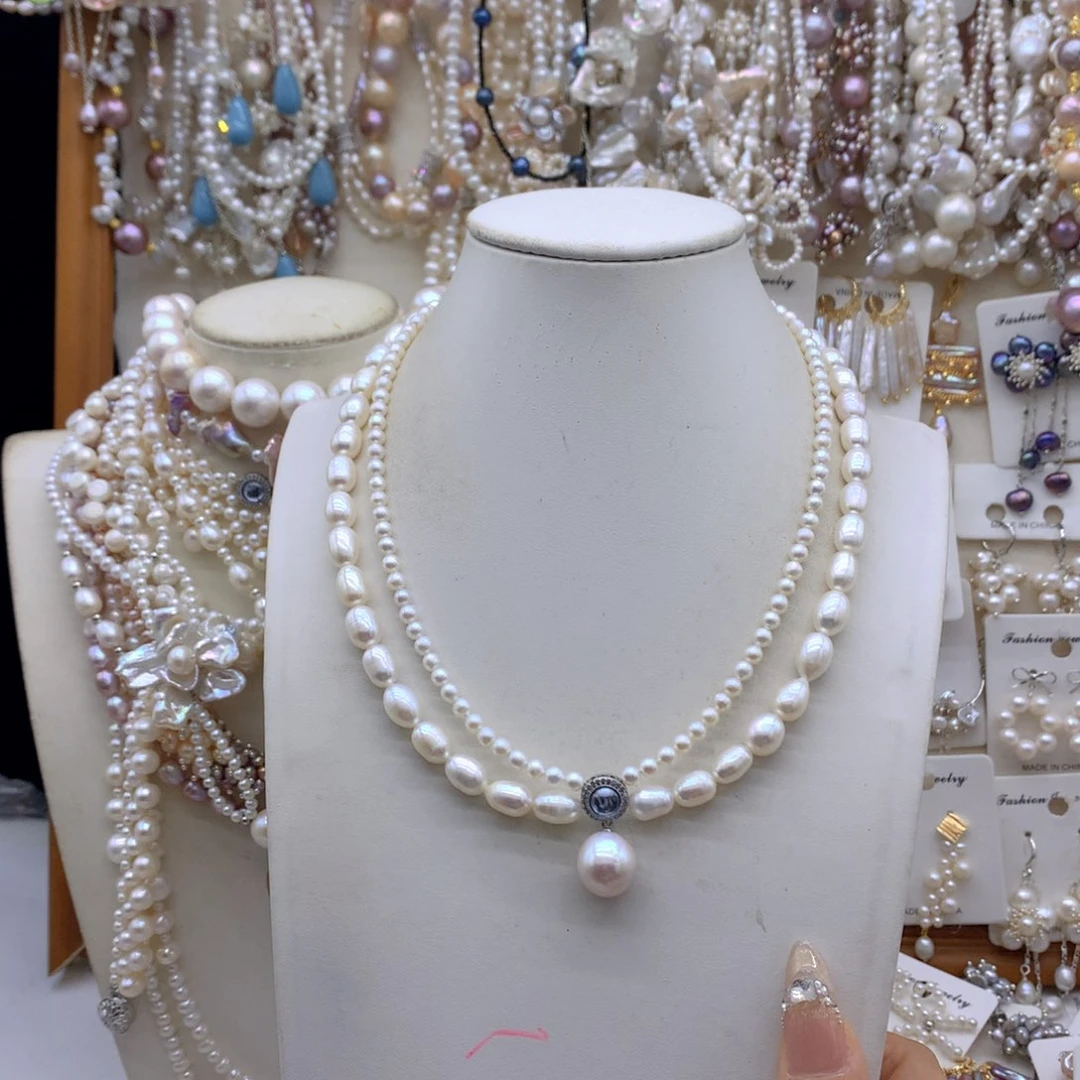 李***丽银S925镶嵌淡水珍珠项链耳饰