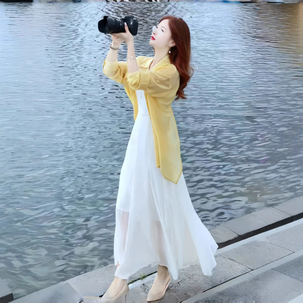 早春海边度假连衣裙女夏季新款冰丝防晒衬衫吊带裙两件套装长裙子