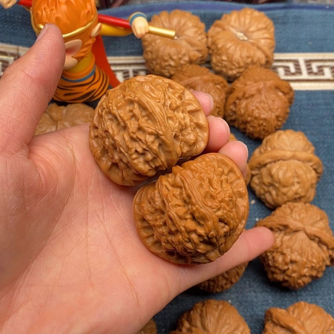 文玩核桃把件?**哥44全品三角白