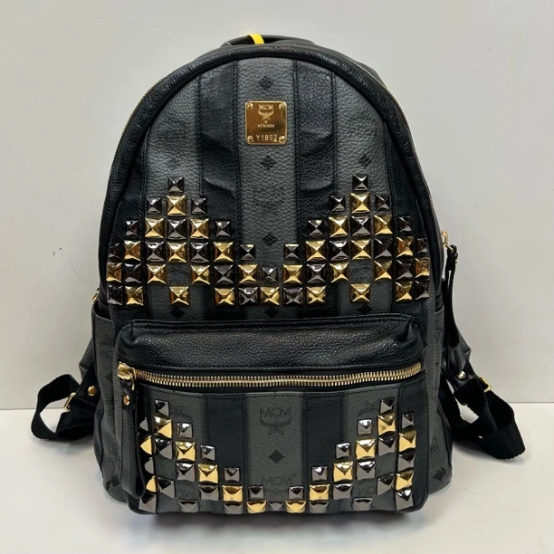 99新 MCM 黑色铆钉全皮双肩包1719