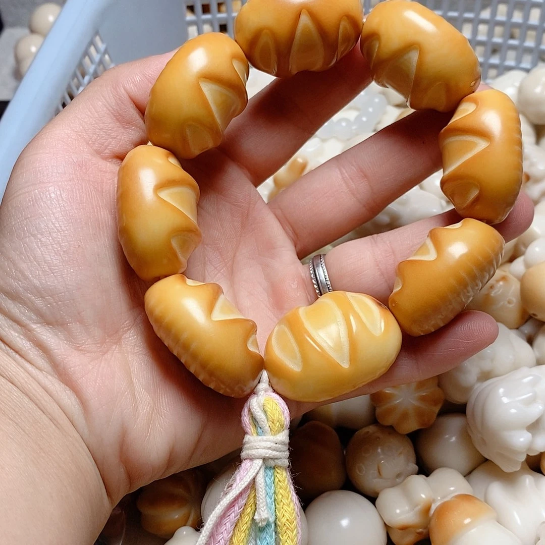 菩提根/象牙果吊坠微瑕疵大面包手持款