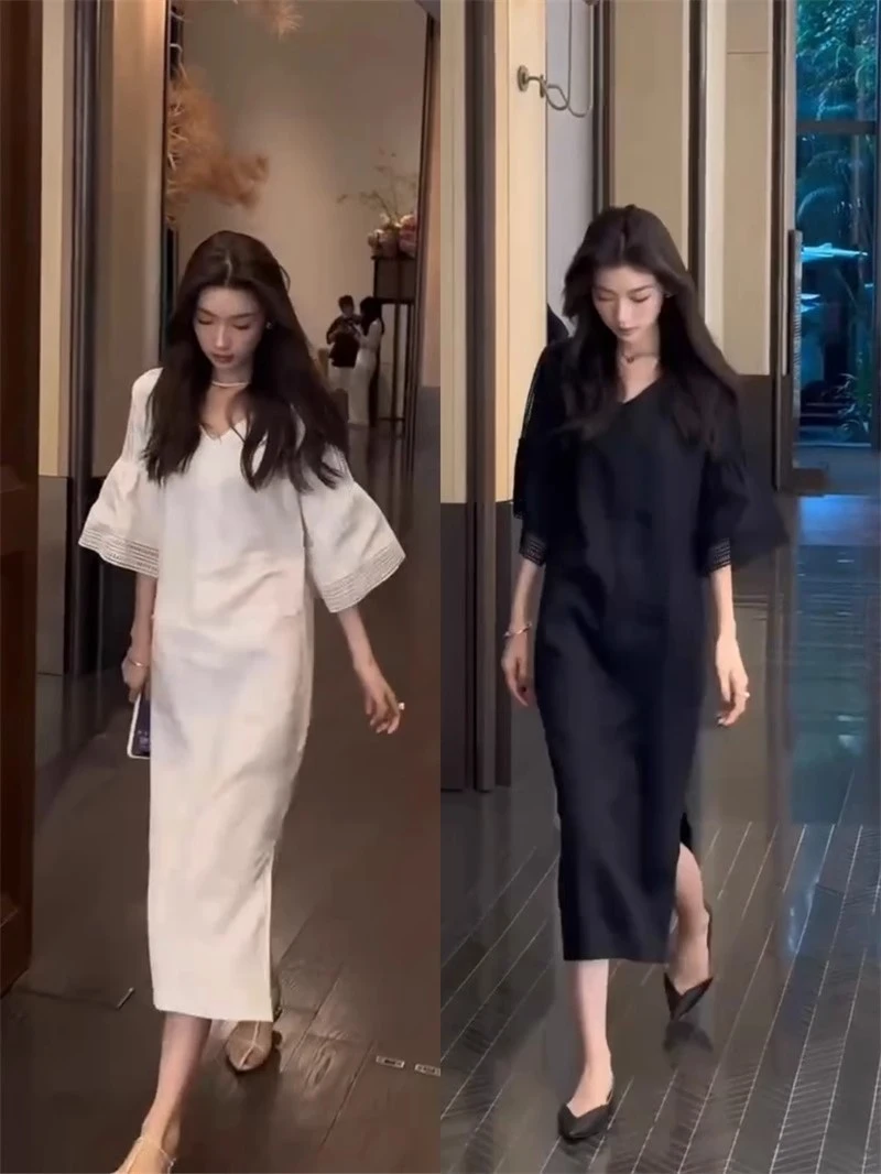 气质亚麻镂空拼接v领白色连衣裙2025夏季设计感宽松优雅开叉长裙