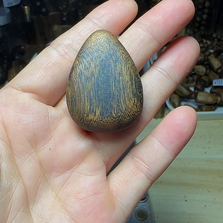 炎***炎乌身树心吊坠4.3克