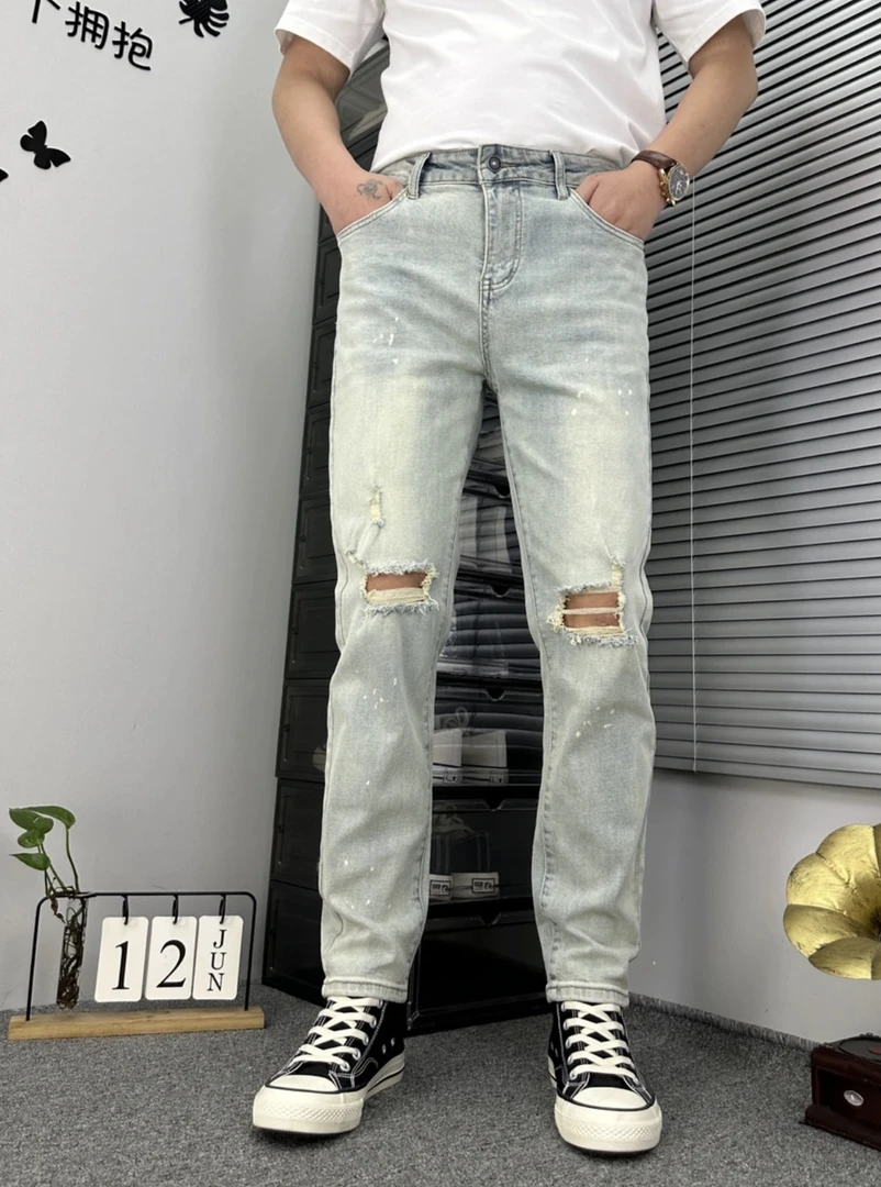 修身小脚泼墨水洗薄款破洞牛仔裤个性宽松直筒休闲