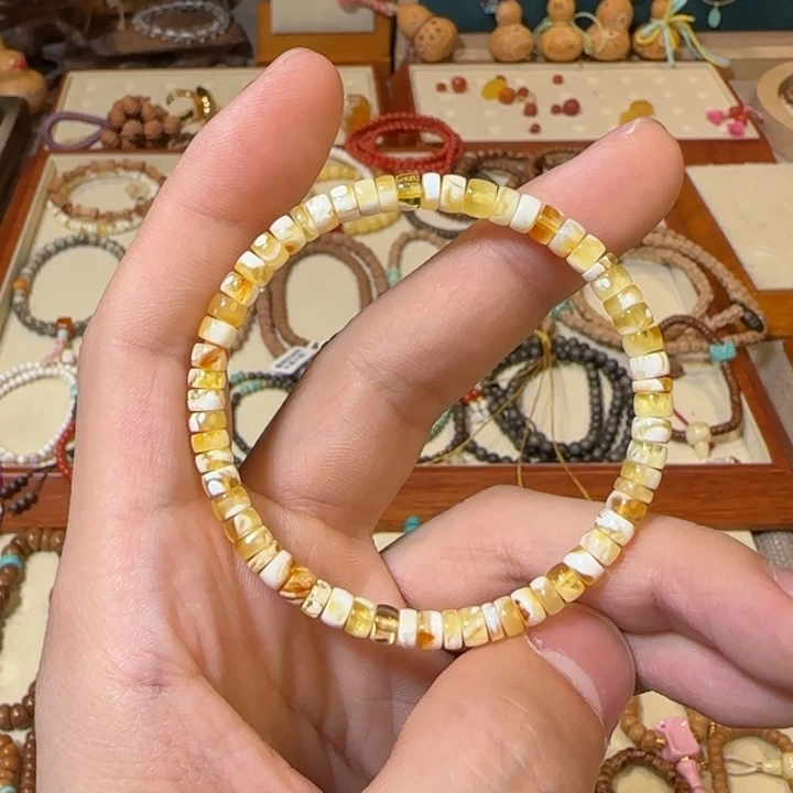 蜜蜡未镶嵌手串金瓷白妖花药片手串