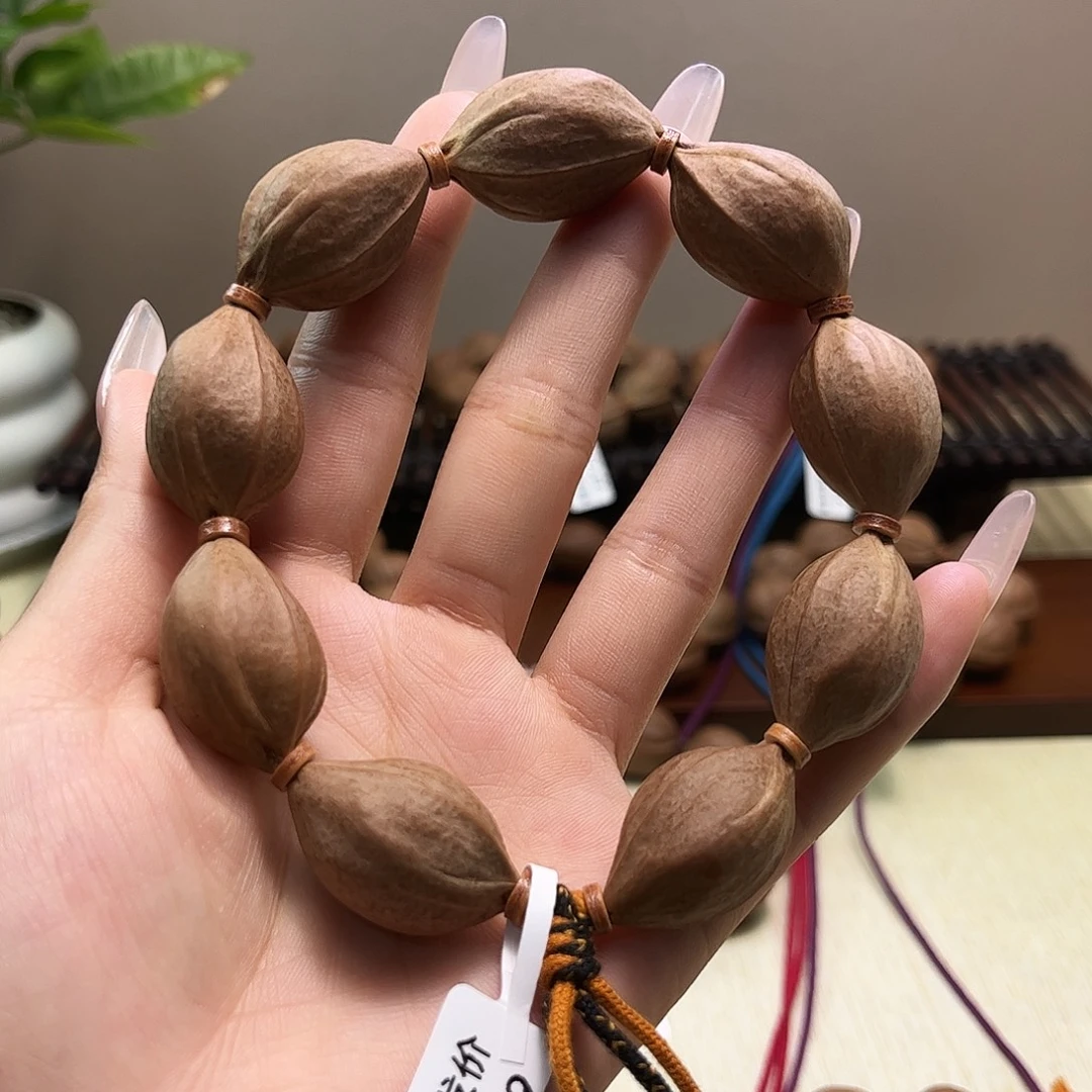 橄榄核吊坠梅林铁核文玩手串