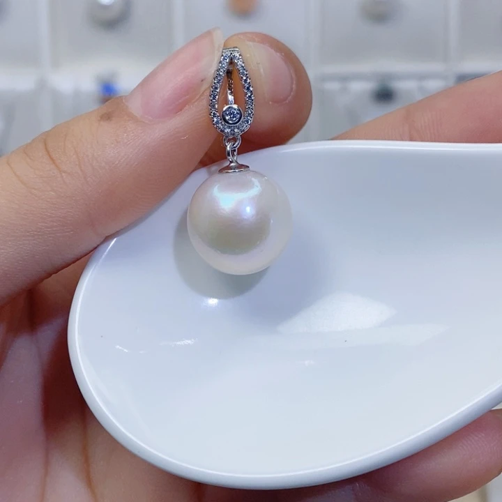 桃***@颈饰淡水珍珠银S925镶嵌13mm