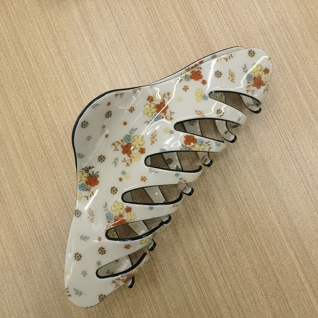 F557米黄色碎花抓夹