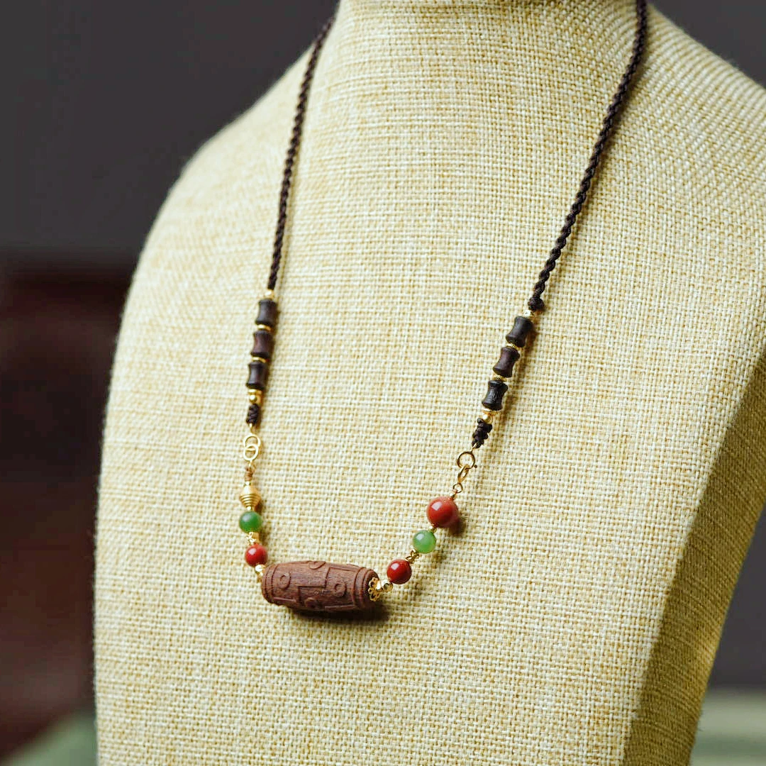 C057 九眼 降真香木带宝锁骨链