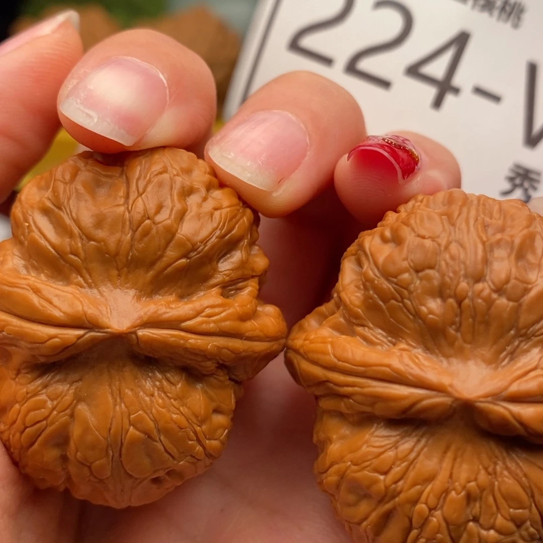 桃核把件元宝42……