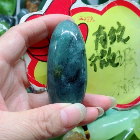 未镶嵌蛇纹石玉手把件