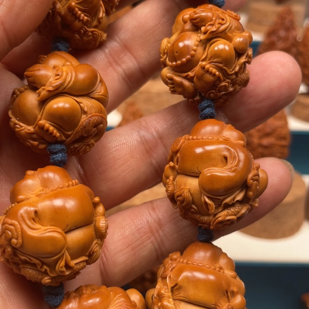 爱***钱橄榄核手串/手链11111111111111111