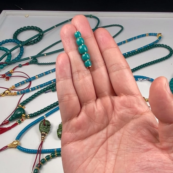 劳***赁颈饰玻璃油绿67876