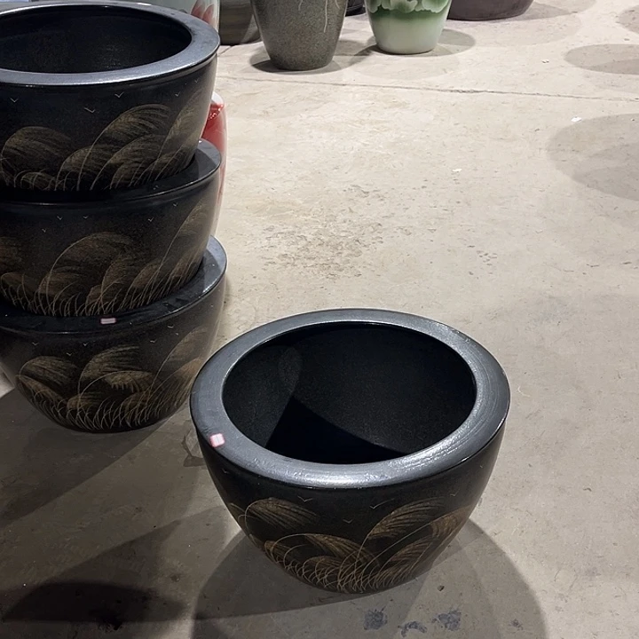 胡***明景德镇陶瓷鱼缸艺术
