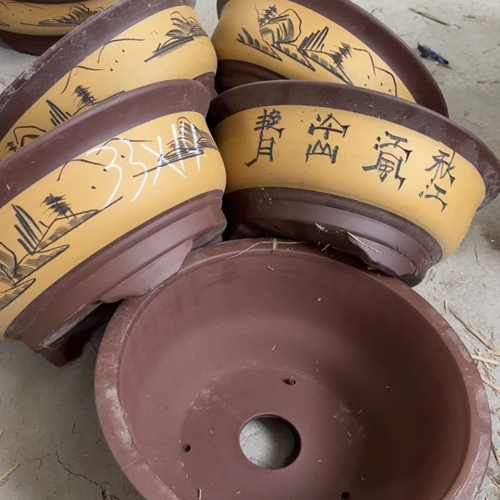 紫砂花盆100-5。          33-14