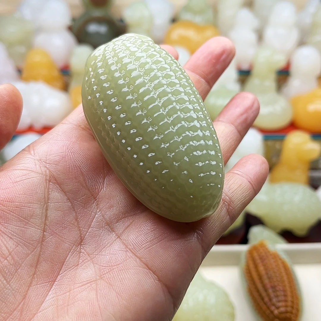 忘***却石材玉米手把摆件