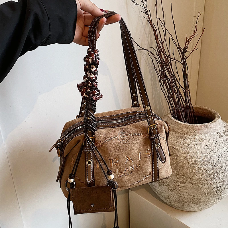 秋冬复古麂皮绒包包女2025新款网红爆款时尚百搭斜挎包手提枕头包