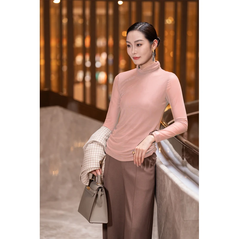 首尚格释秋季新款弹力网纱打底衫