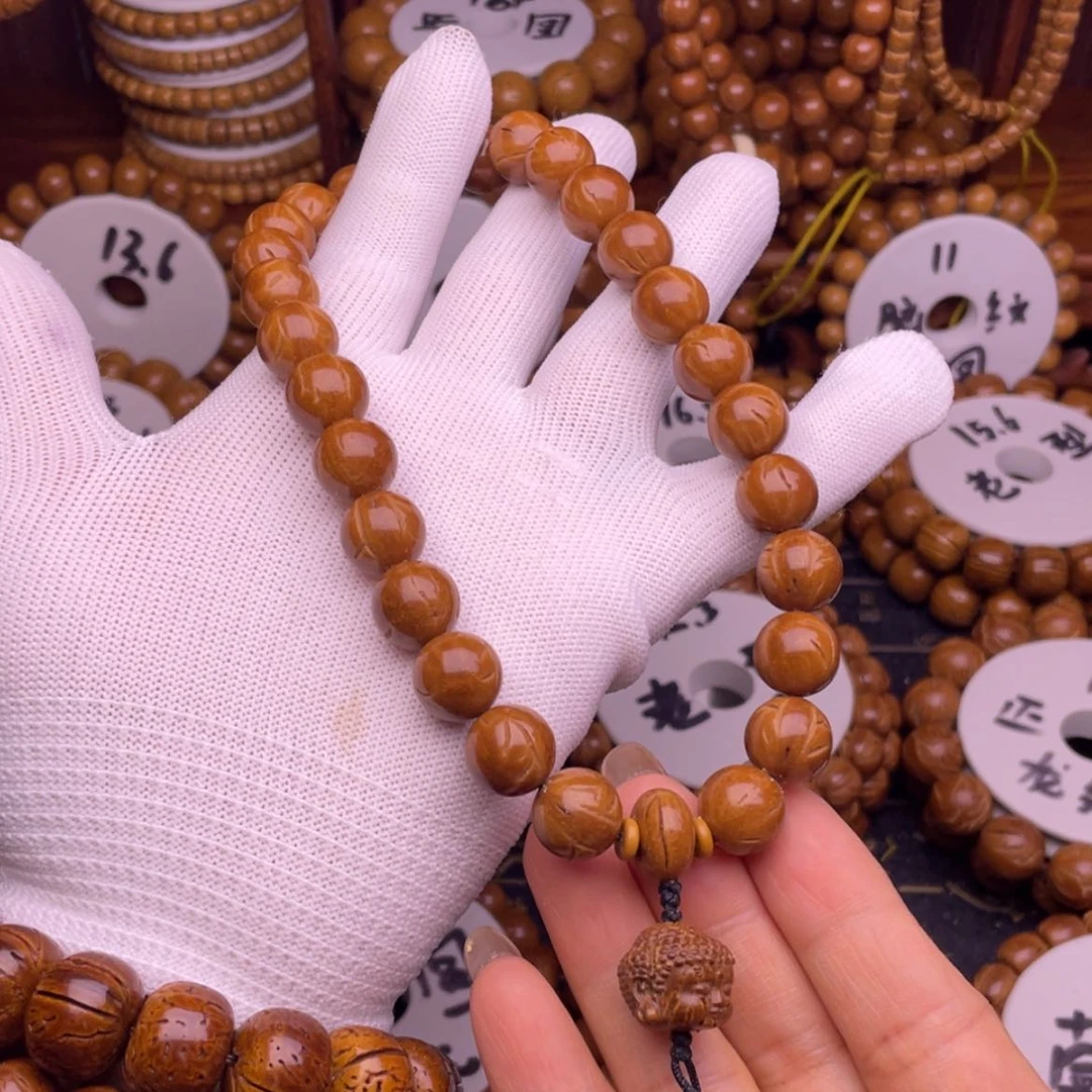 【闪购商品】桃核吊坠12.7龙纹手持桃核