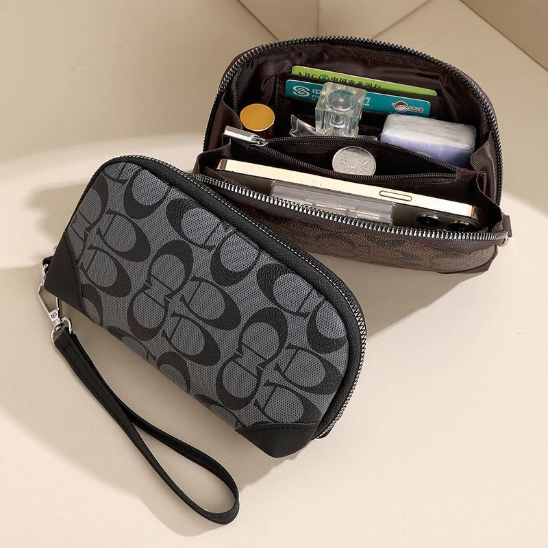 手拿包手抓包城市轻运动风机能风ins风东方洛可可风手腕包韩版