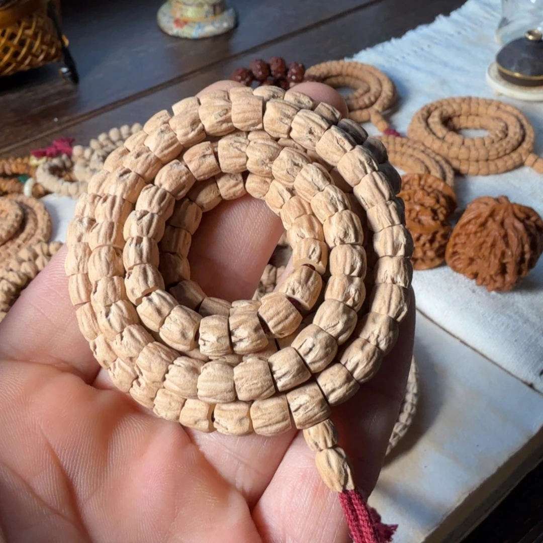 手串柏香籽/百香籽斜切红皮药片