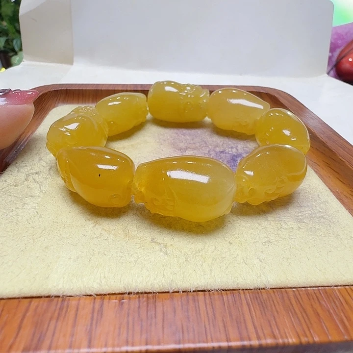 爱***光石英质玉（黄龙玉）未镶嵌手串