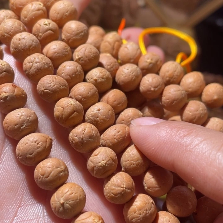 桃核把件四星麒麟眼108颗