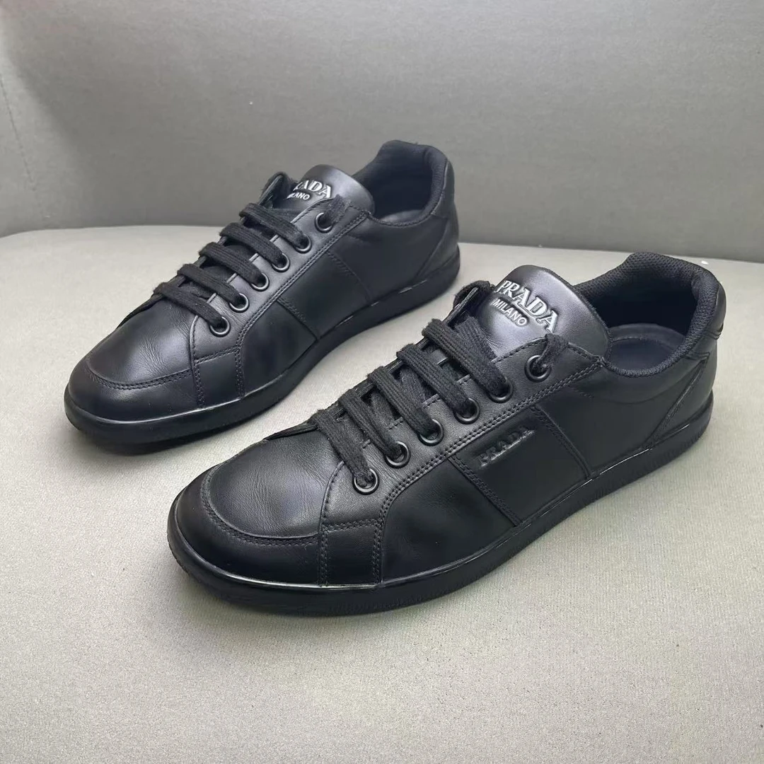 95新 Prada/普拉达 黑色时尚百搭侧翼压印logo低帮板鞋 多尺码